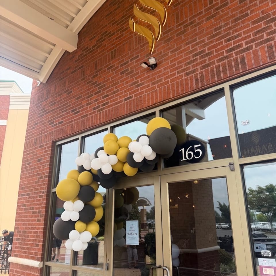 Haraz High Point entrance decorated with balloons.